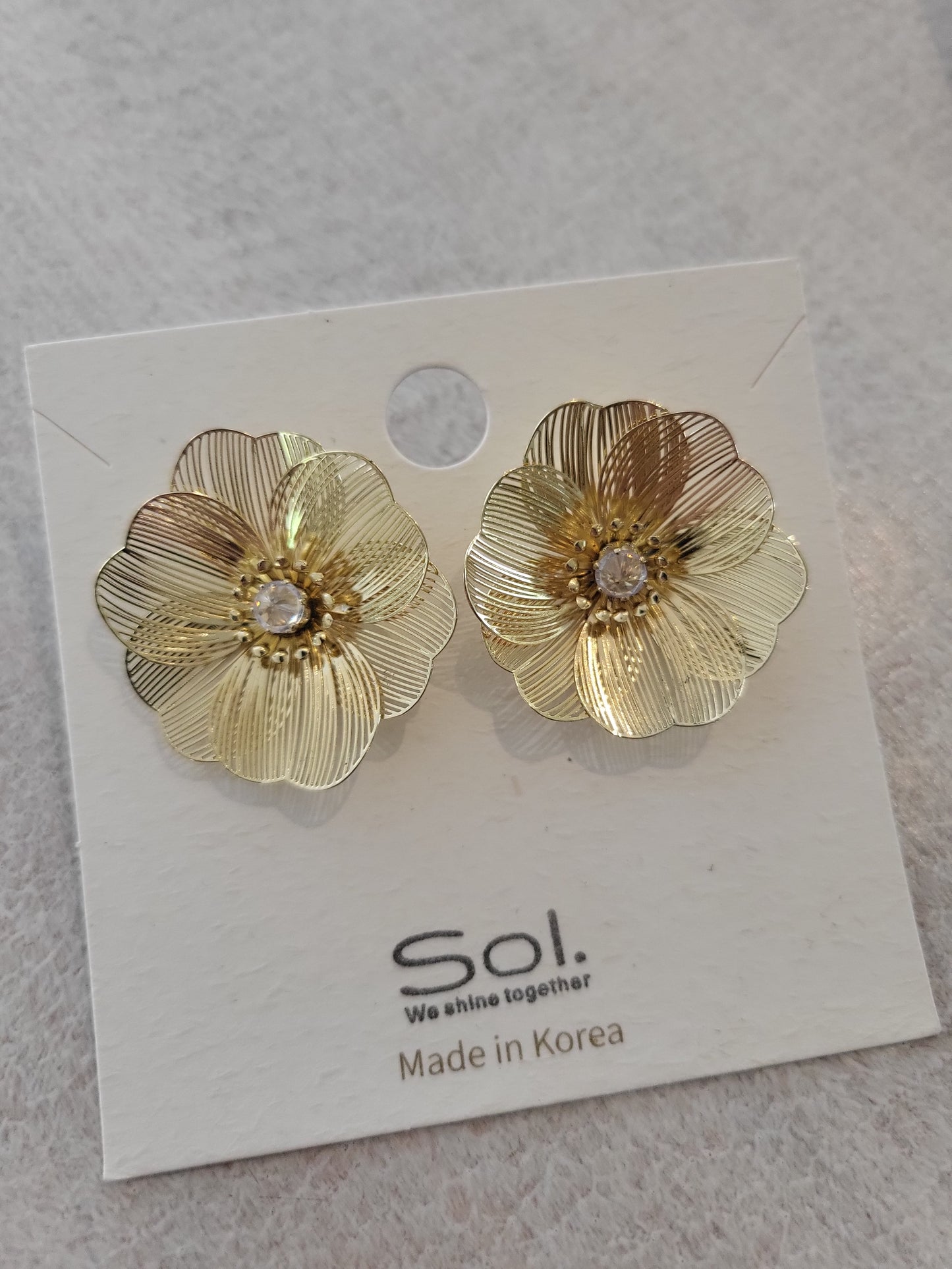 Öronhängen i guld (blomma)